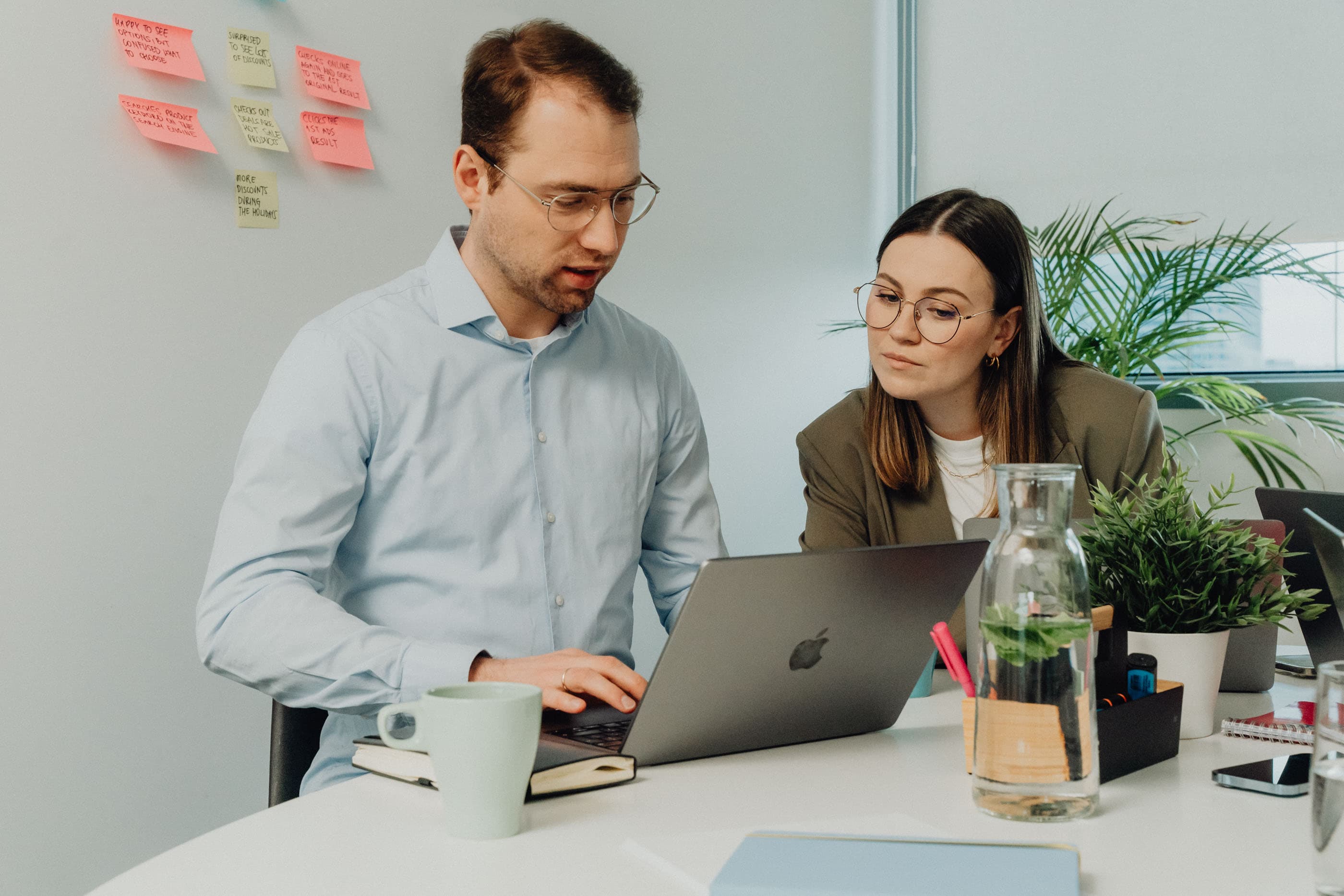  Business professionals analyzing SaaS RFP documents and evaluating vendor proposals in a digital workspace